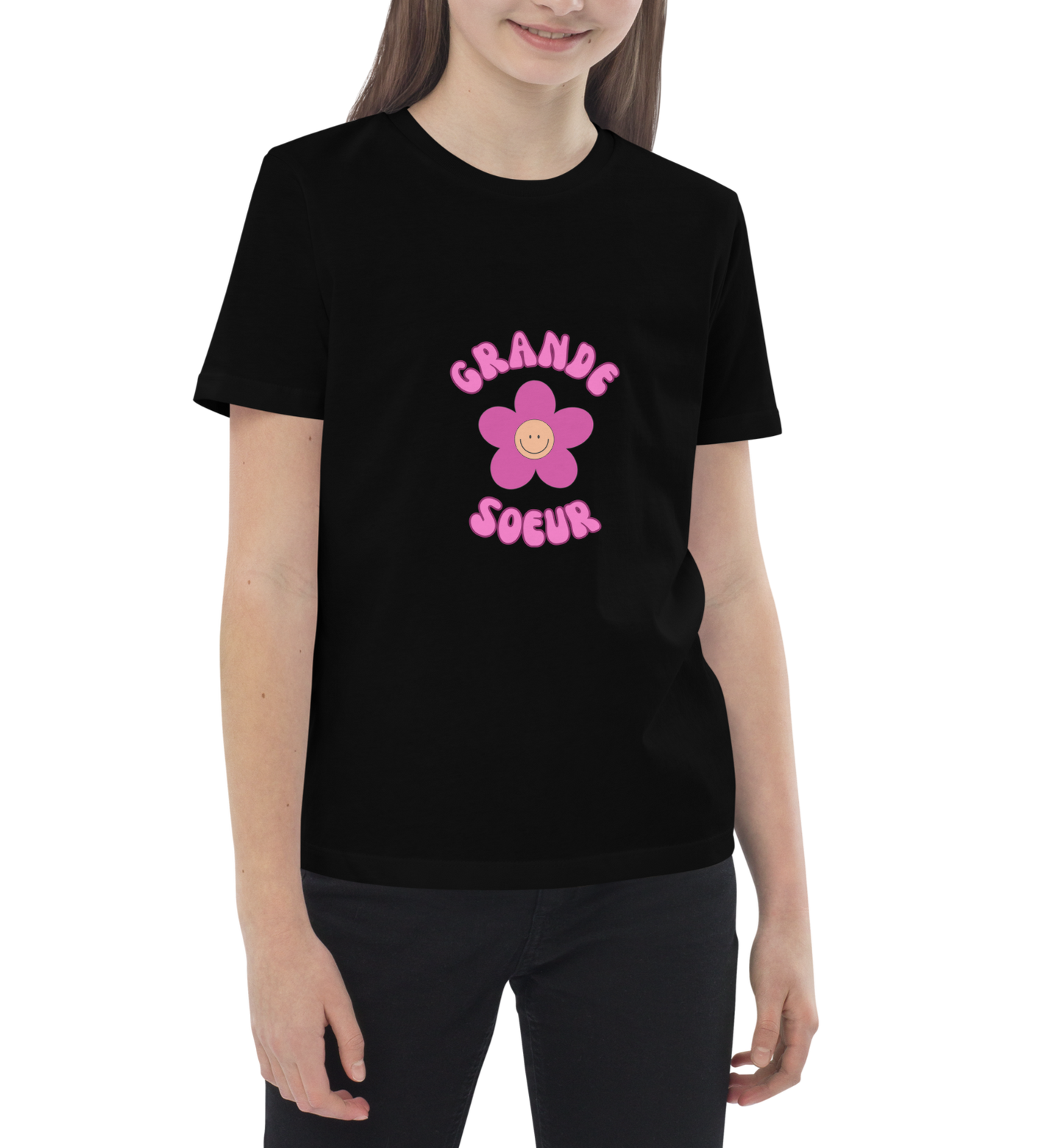 T-shirt enfant noir manche courte encolure ronde 100% coton bio avec inscription Grande soeur porté par une mannequin de 10 ans